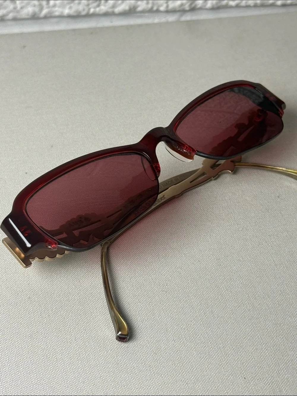 Judith Leiber Red Rectangular Frames with Decorative Metal Temples